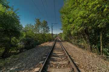 Empty railway track and bridge in summer sunny day in Tabor town