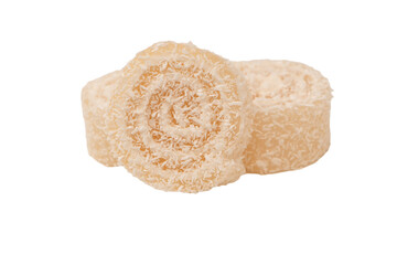 Coconut candy roll isolated on a white background.