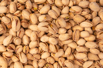 Tasty pistachios isolated on a white background.