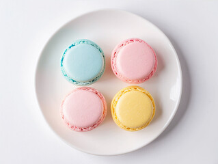 Obraz premium Minimalist Pastel Macarons on a White Plate