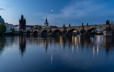 Prague, Czech Republic, Charles Bridge (Karluv Most) reflecting in Vltava river at blue hour
