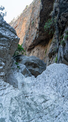 Deepest narrow stone canyon Saklikent in national park in Mugla Province in southwestern Turkey. Wild natural beauty. Vertical image
