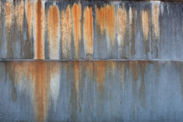 Concrete wall with rust