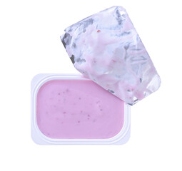 Open packing with blueberry yoghurt or tasty dessert isolated on a white background.  Top view.