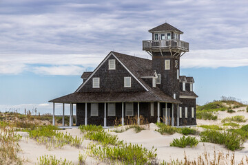 Oregon Inlet Life Saving Station with Dune Grass and sand dunes