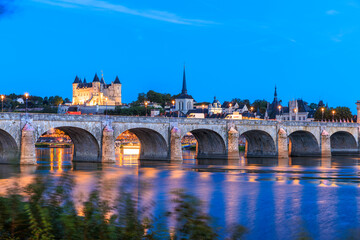 Saumur, France, located at the Loire river during dusk