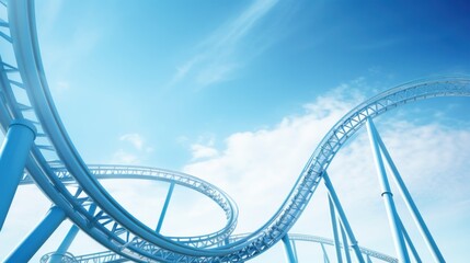 Naklejka premium A vibrant rollercoaster track loops gracefully against a clear blue sky, creating an exciting and dynamic scene.