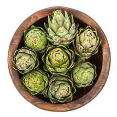 Obraz premium Several fresh artichoke heads lying in an old wooden bowl, shot from above on a white background