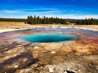 Opal Pool in the Midway Geyser Basin, Yellowstone National Park in Wyoming.