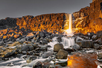 Landscape of Oxararfoss waterfall in Thingvellir National Park,  Iceland. Oxararfoss waterfall is the famous waterfall attracting tourist to visit Thingvellir located in route of Iceland Golden Circle