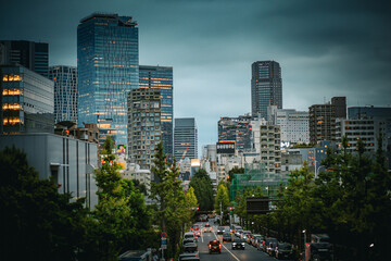 Vibrant street scenes and modern skyline of Tokyo, Japan, blending the city’s contemporary architecture with its lively street culture in bustling shopping districts and towering skyscrapers.
