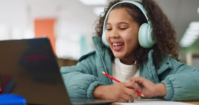 Girl, school and happy with laptop for video call at library for online tutoring, virtual class and education. Kid, elearning and smile with headphones for distance learning and child development