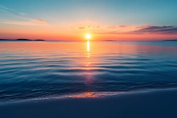 Fototapeta premium Beautiful sunset over the ocean, golden light on the water, and a calm beach, perfect for nature photography, travel and vacation concepts