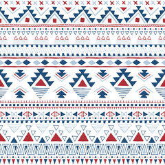 A vibrant geometric pattern featuring triangles and lines in red, navy, and white, suitable for textiles or graphic design.