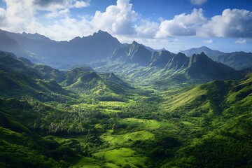 Obraz premium Aerial View of Lush Green Mountains with Blue Sky and Clouds