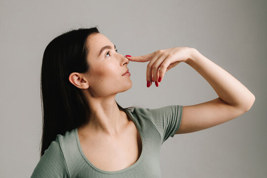 Rhinoplasty and septoplasty. Young girl is suffering from deviated nasal septum. Healing breathing issues with rhinoplasty. Abuse of vasoconstrictor nasal drops is leading to addiction.