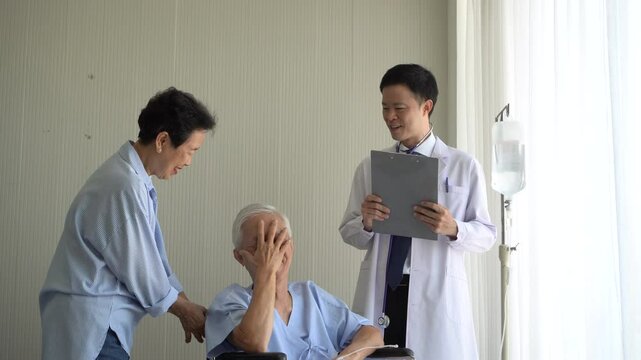 Asian doctor fun friendly coversation senior patient happy laugh relax treatment hospital