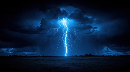 A powerful lightning bolt striking down on a dark field under a stormy night sky with dramatic clouds.