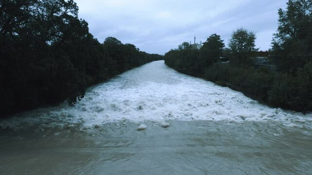 A raging river after a storm under a cloudy sky, Schwarza, Neunkirchen, Lower Austria, Austria, Europe