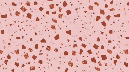 Close up view of a abstract pink terrazzo surface with scattered, irregularly shaped chips in various shades of pink on it textured background