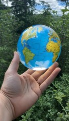 glass globe hand  earth glasses globe eco grass moss nature planet green environment sphere ecology field life map holding human hand world map recycling crystal energy environmental conservation day