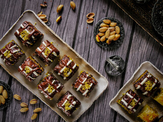 turkish baklava, turkish traditional sweet desserts. made of philo pastry sheets, filled with pistachio ground and doused with syrup
