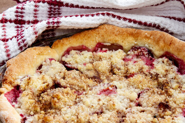 Freshly baked homemade plum platz.  Delicious coffee cake made with plums and a sugar-butter topping