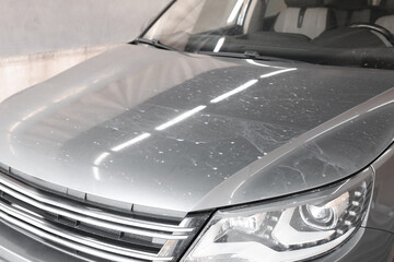 Modern auto with dirty stains, closeup view