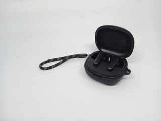 black bluethooth tws with white background