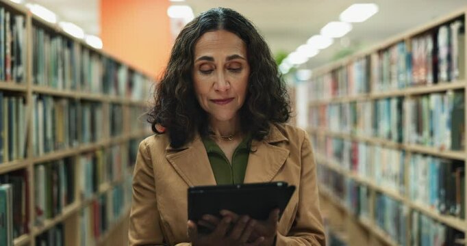 Mature, woman and librarian with tablet in library for books inspection, digital literacy and e resources management. Female author, equipment and story information, research access and publish store