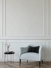 Minimalist interior design with an elegant armchair, cushion, and side table. Classic white wall molding adds a touch of sophistication.