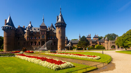 Fototapeta premium Summer landscape with a view of the ancient castle De Haar, located near the city of Utrecht and is one of the most visited ..places in the Netherlands