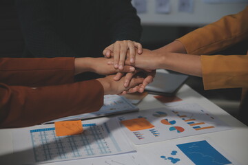 Hand join together for work togetherness, Hand stack for business and service, Team volunteering or teamwork. Concept connection of community and charity. Group of business workforce participation.