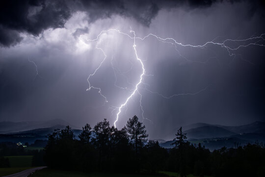 lighting at a heavy thunderstorm in the bavarian alps near Siegsdorf, Chiemgau, Bavaria, Germany