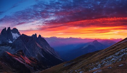 Dramatic Mountain Range Framed by a Colorful Sunset Sky, a Nature Lover's Paradise