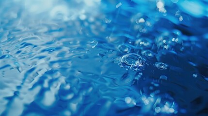 Water Drops on Blue Water Surface