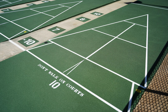 empty green shuffleboard court 