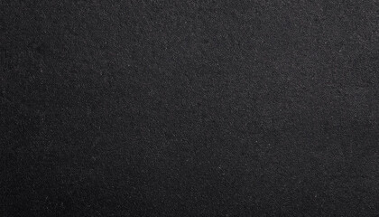 Obraz premium Grainy black paper texture macro close up view