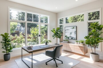 An open-concept home office with a minimalist desk, large windows, and a plant-filled corner