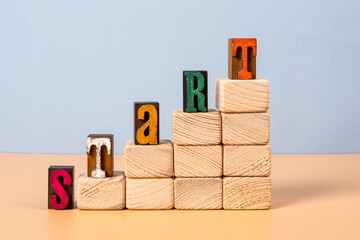 START. Wooden blocks and the alphabet. Development concept