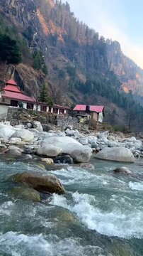 Manali, Himachal Pradesh - India January 15 2024: Beas river manali close up with selective focus and blur
