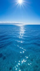 Obraz premium wave clear panorama sunlight sun beautiful blue open sky vast calm ocean sea ripple reflection sea sea ocean water seascape open huge day at water level surface blue wave shiny water summer horizon