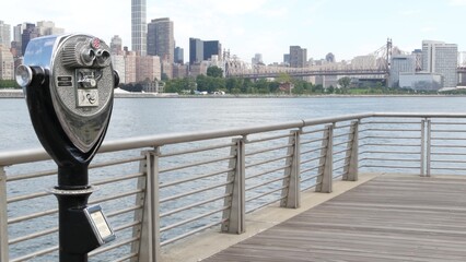 New York City waterfront skyline, Manhattan Midtown buildings, riverfront skyscrapers. Waterside cityscape, tower viewer, Gantry Plaza. Long Island, Queens. United States tourism. Queensboro bridge.