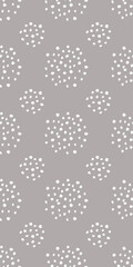 A repeating pattern of white dots on a gray background, suitable for graphic design and textile applications.