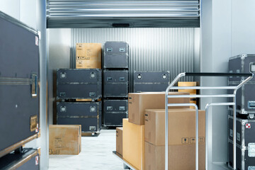 Filming equipment warehouse. Storage unit with universal cases for technique. Cinema equipment...