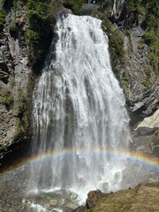 Waterfall with a rainbow across it