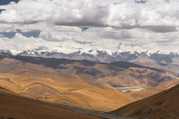 Road of Friendship in Tibet with the view of the mountains and the road