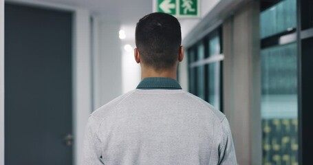 Business, man and walking with back in office for coffee break, professional career and morning commute. Employee, person and travel in company building for meeting, workplace departure or arrival