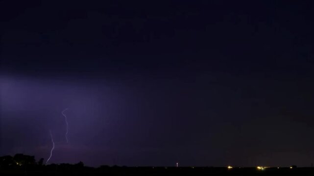 Lightning thunderstorm flash over the night sky Concept on topic weather