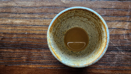Top view latte art coffee on wood background